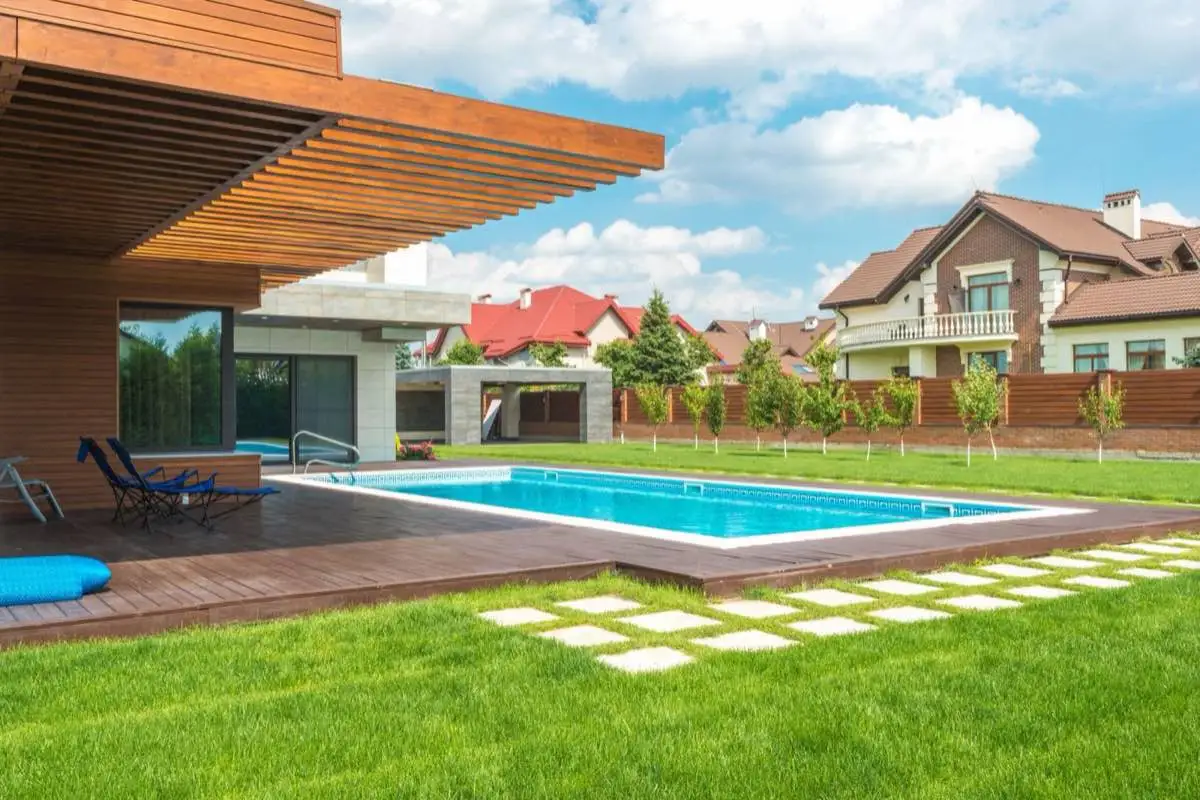 Pebble interior finish on a backyard swimming pool in Santa Clarita, CA